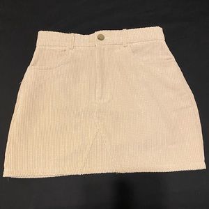 Cord skirt with front pockets.